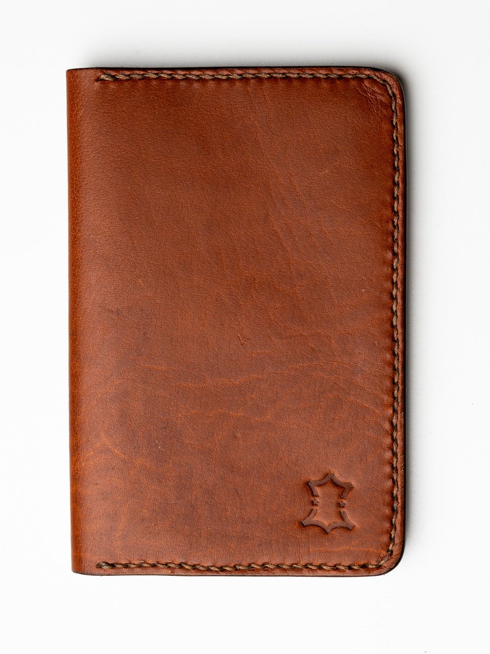 Brown leather wallet with stitching detail on a white background