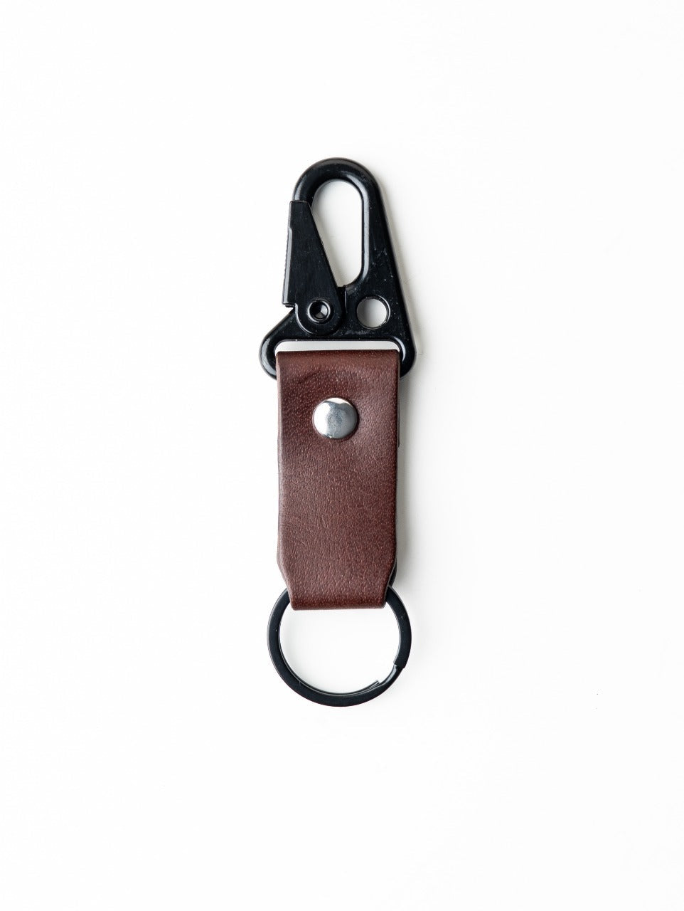 Brown leather keychain with black metal clip on a white background