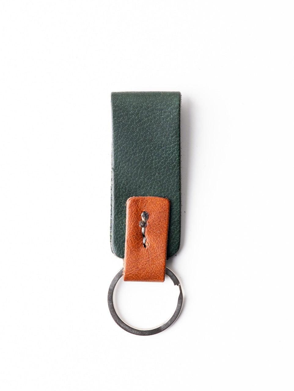 Green leather key fob with brown accent on a white background